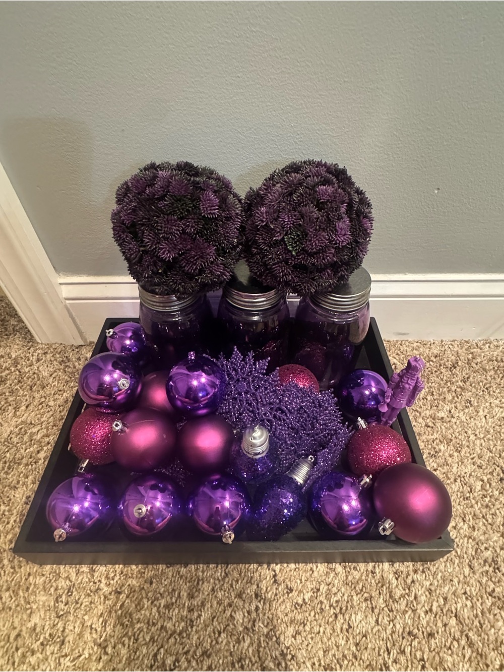 Purple ornaments, mason jars, sedum decorative balls, snowflakes & serving tray